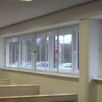 Commercial sliding fly screens