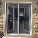 Double roller fly screen doors