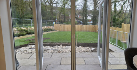 Roller fly screen door with the mesh in the closed postion